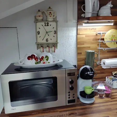 Loft Mansardato Apartmán *